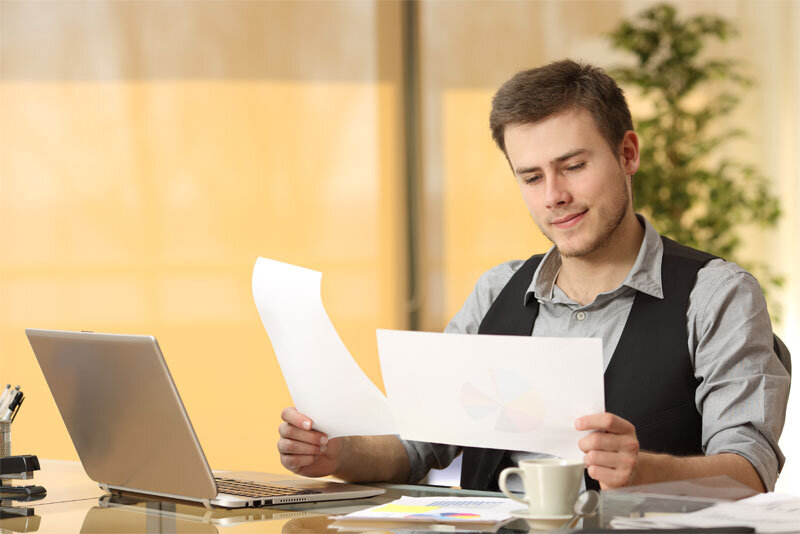Man Reviewing Documents