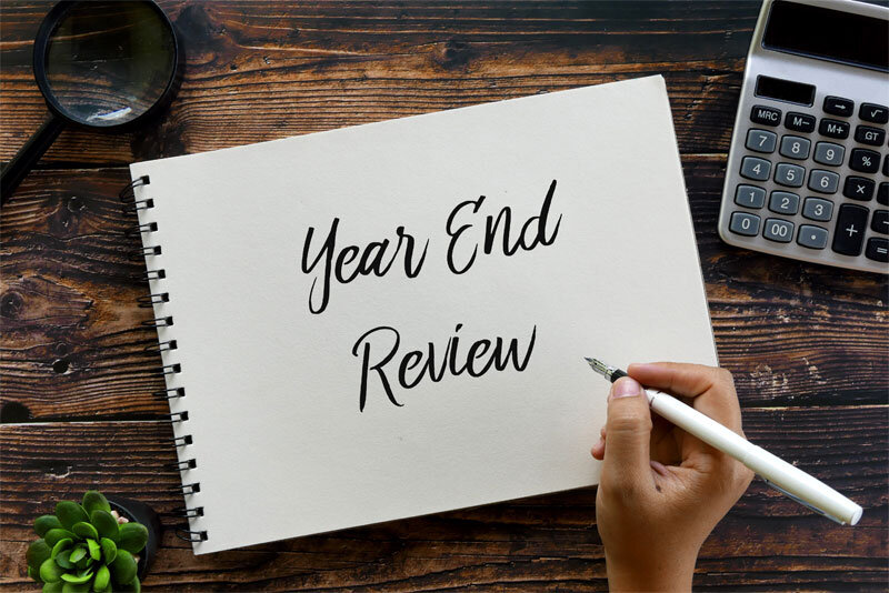 Year End Review Written on Pad